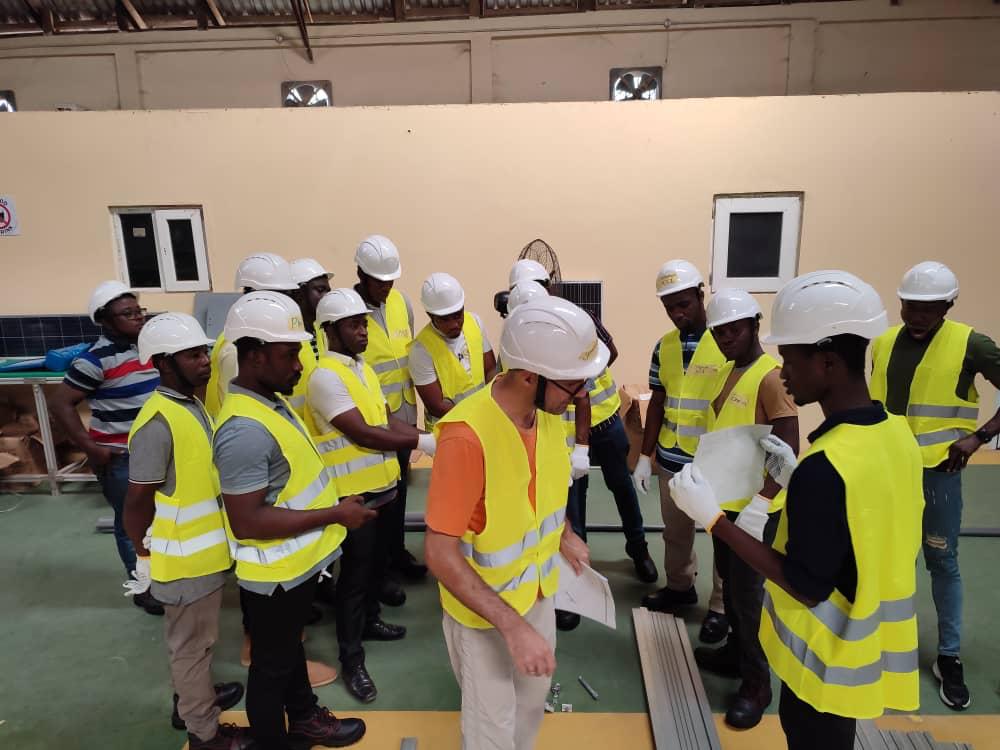 6G Engineering team discussing a solar project